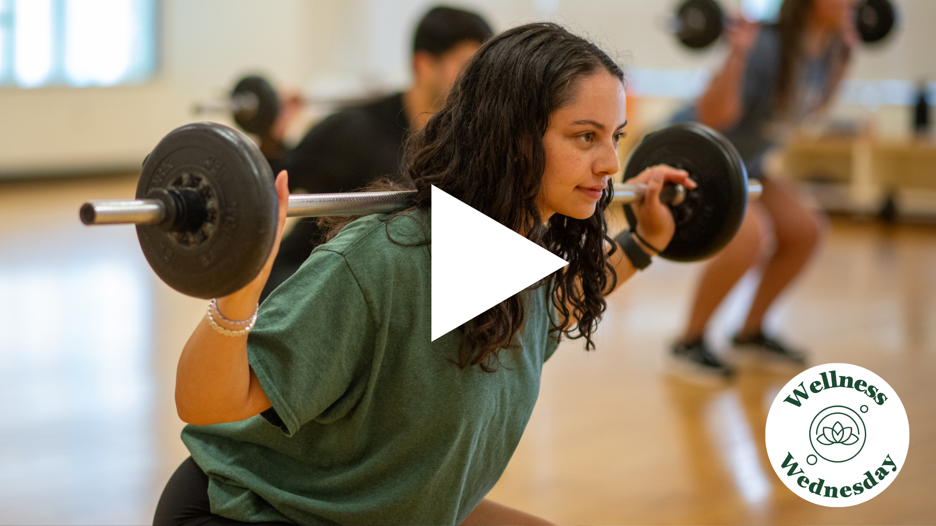 Girl lifting weights. Wellness Wednesday graphic. Play Button.